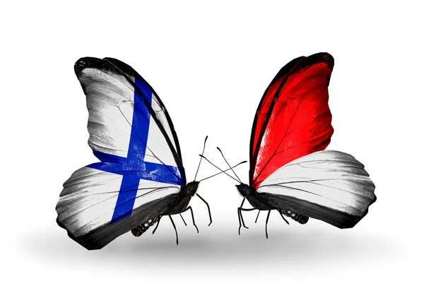 Butterflies with Finland and Monaco, Indonesia flags on wings — Stock Photo, Image