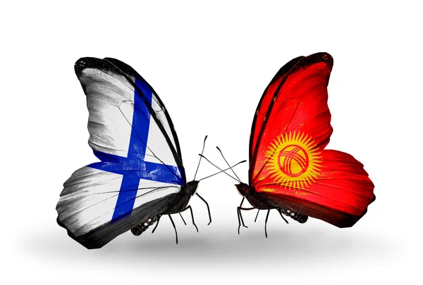 Papillons avec drapeaux finlandais et kirghiz sur les ailes — Photo