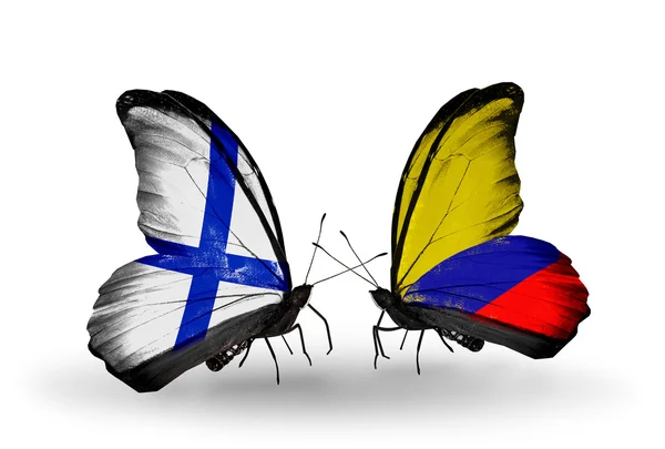 Mariposas con banderas de Finlandia y Colombia en alas — Foto de Stock