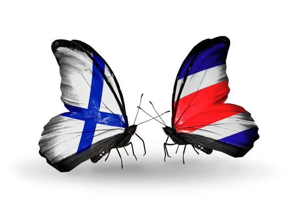 Papillons avec drapeaux Finlande et Costa Rica sur les ailes — Photo