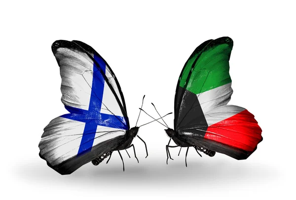 蝴蝶翅膀上的芬兰和科威特标志 — 图库照片