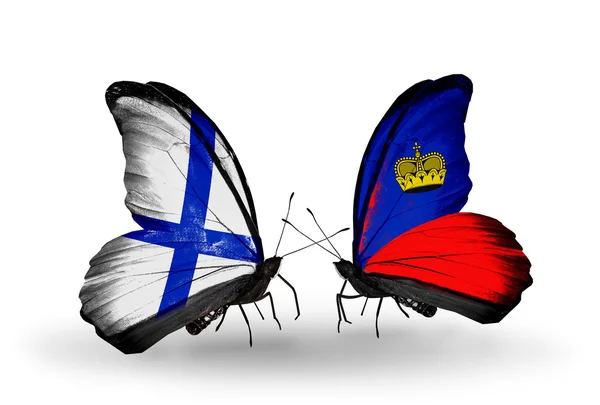 Butterflies with Finland and Liechtenstein flags on wings — Stock Photo, Image