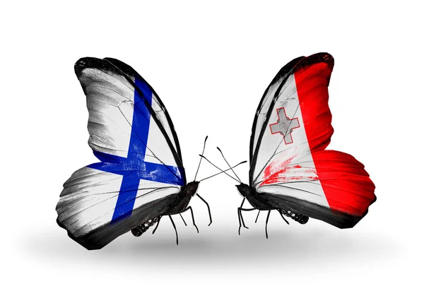 Butterflies with Finland and Malta flags on wings — Stock Photo, Image