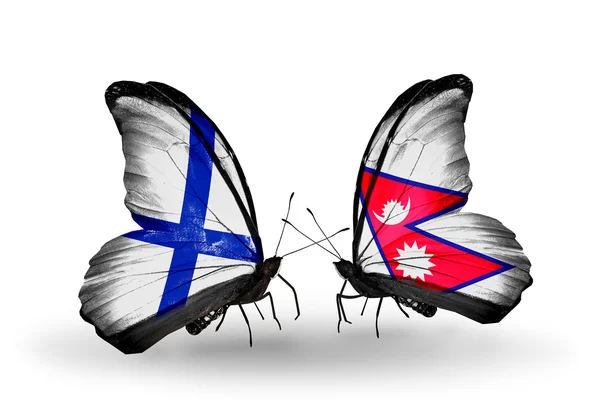 Mariposas con banderas de Finlandia y Nepal en alas —  Fotos de Stock