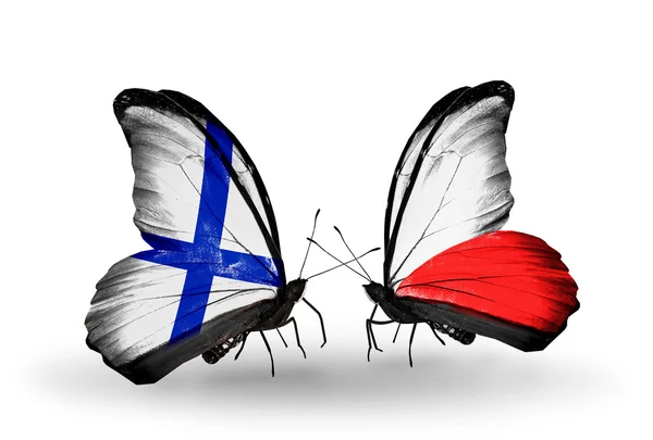 Butterflies with Finland and Poland flags on wings — Stock Photo, Image