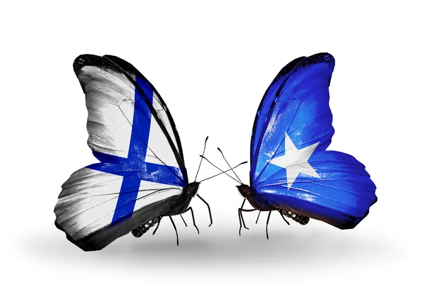 Mariposas con banderas de Finlandia y Somalia en alas — Foto de Stock