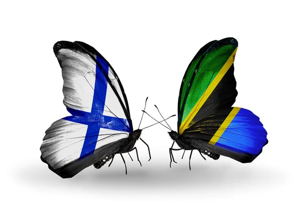 Butterflies with Finland and Tanzania flags on wings — Stock Photo, Image