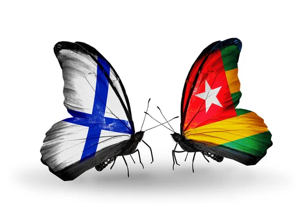Butterflies with Finland and Togo flags on wings — Stock Photo, Image