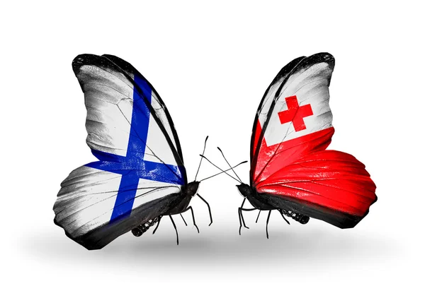 Бабочки с флагами Финляндии и Тонга на крыльях — стоковое фото