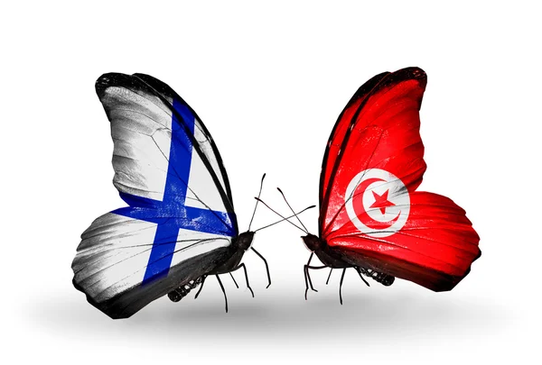 Butterflies with Finland and Tunisia flags on wings — Stock Photo, Image