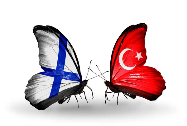 Бабочки с флагами Финляндии и Турции на крыльях — стоковое фото