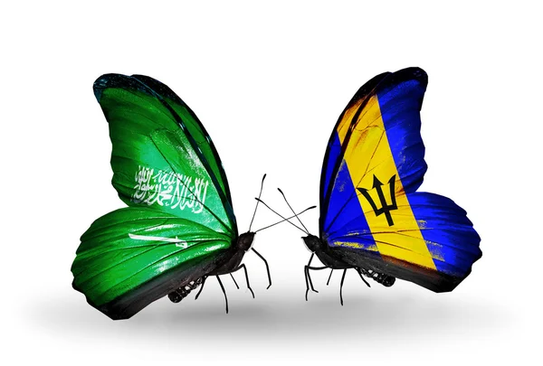 Butterflies with Saudi Arabia and Barbados flags on wings — Stock Photo, Image