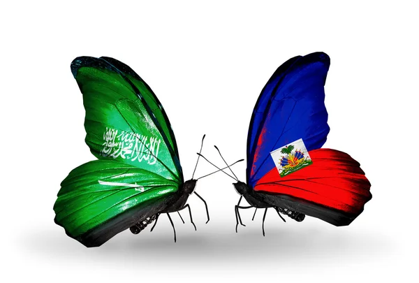 Butterflies with Saudi Arabia and Haiti flags on wings — Stock Photo, Image