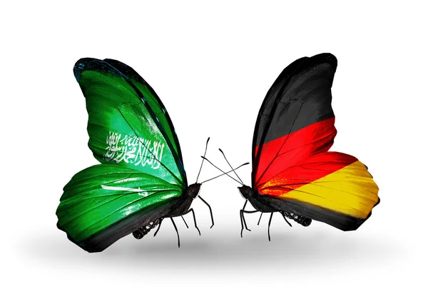 Vlinders met Saoedi-Arabië en Duitsland vlaggen op vleugels — Stockfoto