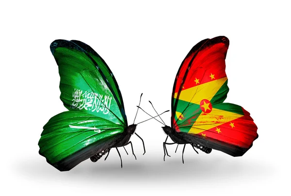 Motyle z Arabii Saudyjskiej i grenada flagi na skrzydłach — Zdjęcie stockowe