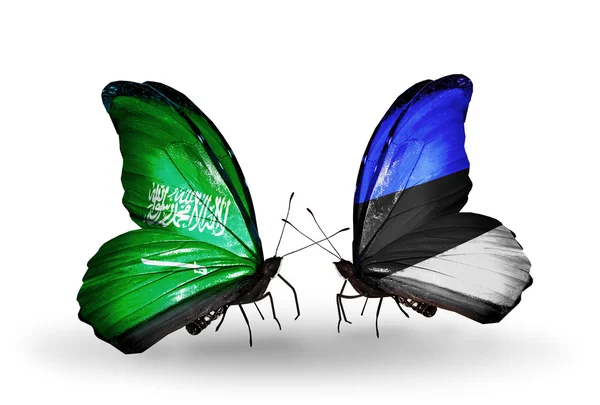 Motýli se Saúdskou Arábií a Estonsko vlajek na křídlech — Stock fotografie