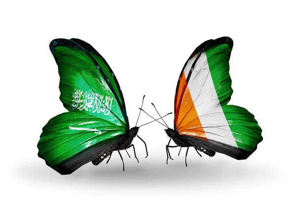 Kelebek kanatları üzerinde Suudi Arabistan ve Fildişi Sahili bayraklı — Stok fotoğraf