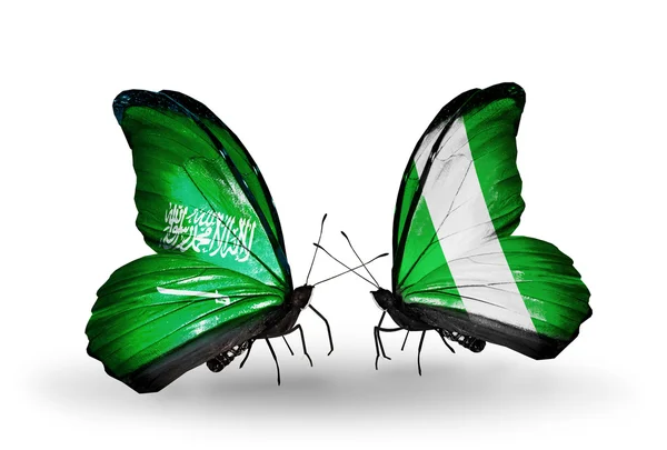 Motýli se Saúdskou Arábií a Nigérie vlajek na křídlech — Stock fotografie