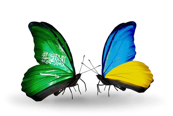 Schmetterlinge mit saudi arabia und ukrainischen Flaggen auf Flügeln — Stockfoto