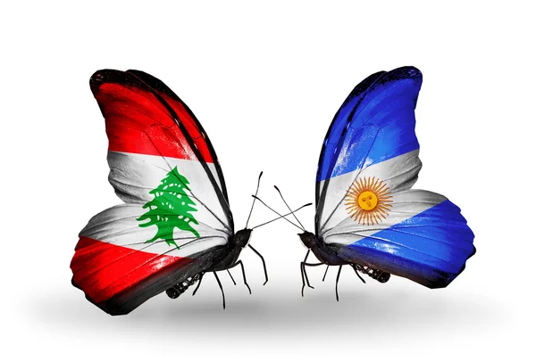 Farfalle con bandiere Libano e Argentina sulle ali — Foto Stock
