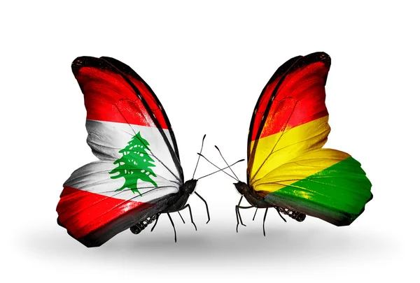 Papillons avec drapeaux Liban et Bolivie sur les ailes — Photo