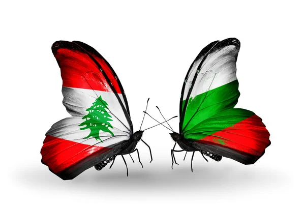 Farfalle con bandiere Libano e Bulgaria sulle ali — Foto Stock