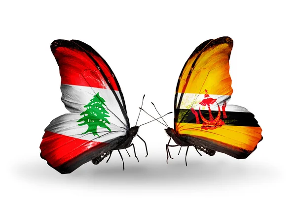 Butterflies with Lebanon and Brunei flags on wings — Stock Photo, Image