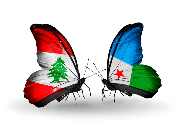 Vlinders met Libanon en djibouti vlaggen op vleugels — Stockfoto