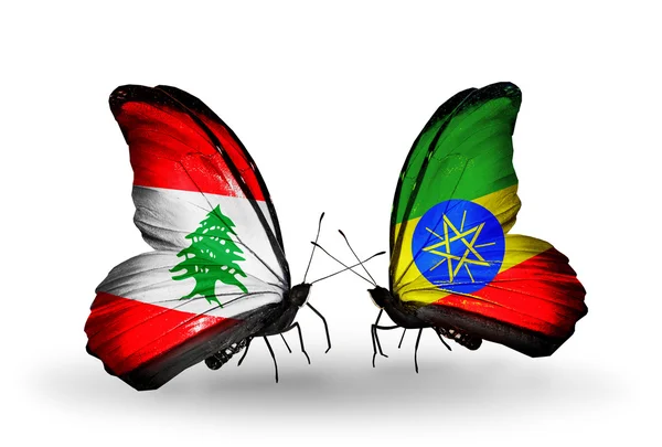 Papillons avec drapeaux Liban et Ethiopie sur les ailes — Photo