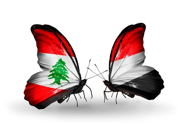 蝴蝶翅膀上的黎巴嫩和也门国旗 — 图库照片