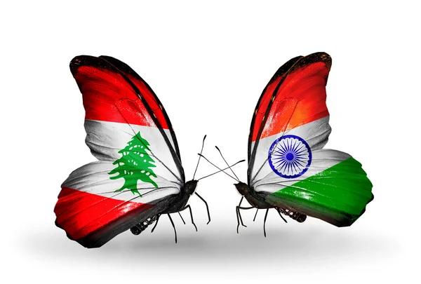 Schmetterlinge mit libanonischen und indischen Flaggen auf Flügeln — Stockfoto