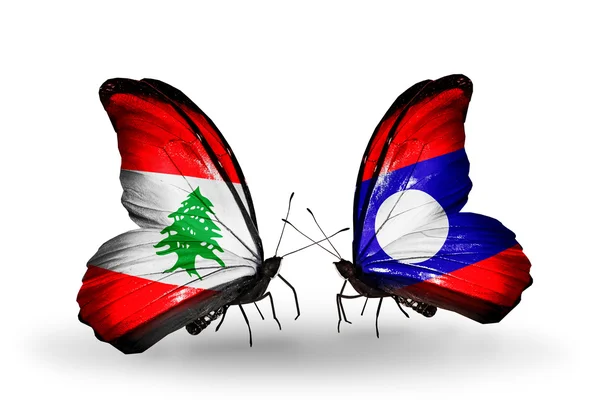 Farfalle con bandiere Libano e Laos sulle ali — Foto Stock