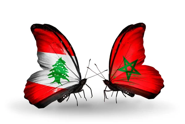 Borboletas com bandeiras do Líbano e Marrocos em asas — Fotografia de Stock