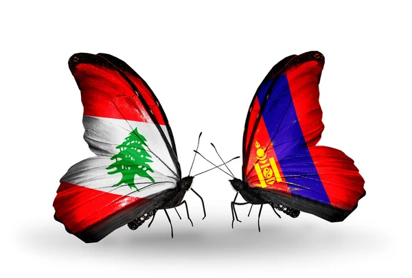 Sommerfugler med flagg fra Libanon og Mongolia på vinger – stockfoto