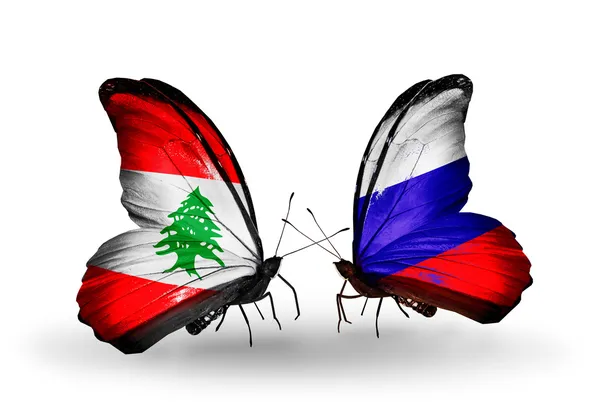 Papillons avec drapeaux Liban et Russie sur les ailes — Photo