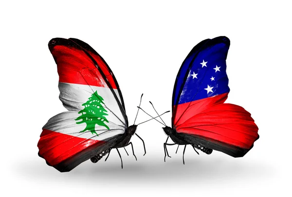 Butterflies with Lebanon and Samoa flags on wings — Stock Photo, Image