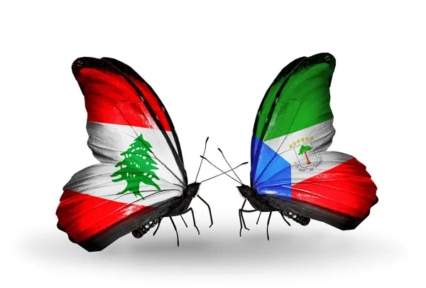 Бабочки с флагами Ливана и Экваториальной Гвинеи на крыльях — стоковое фото