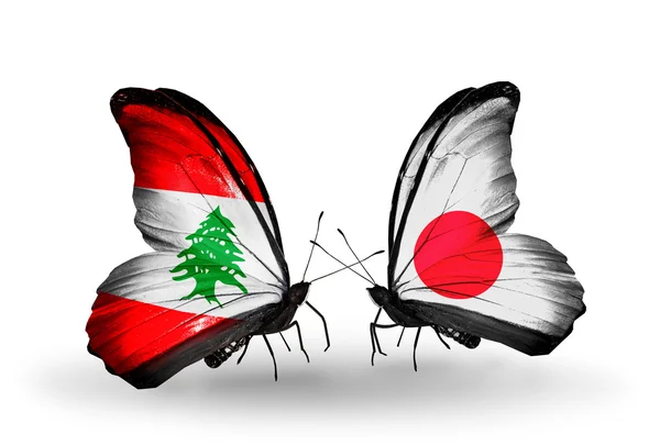 Papillons avec le Liban et le Japon drapeaux sur les ailes — Photo