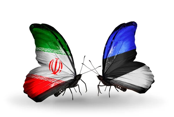 Deux papillons avec des drapeaux de relations Iran et Estonie — Photo