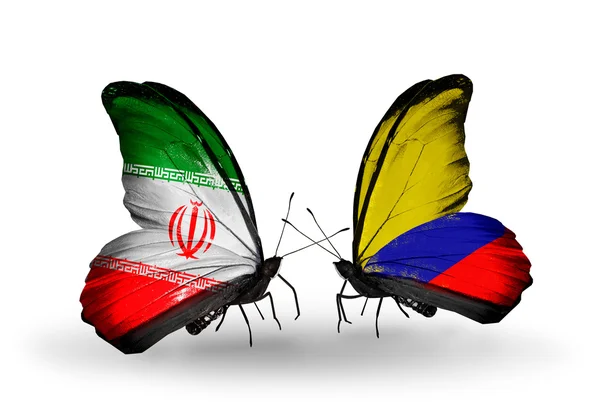 Deux papillons avec des drapeaux de relations Iran et Colombie — Photo