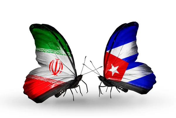 Deux papillons avec des drapeaux de relations Iran et Cuba — Photo