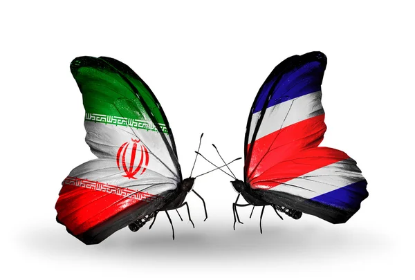 Deux papillons avec des drapeaux de relations Iran et Costa Rica — Photo