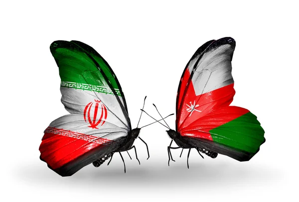 Motyle z flagami Iranu i oman — Zdjęcie stockowe
