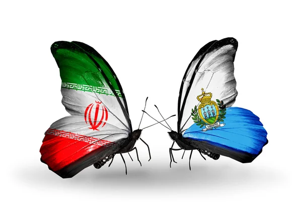 Mariposas con banderas de Irán y San Marino —  Fotos de Stock