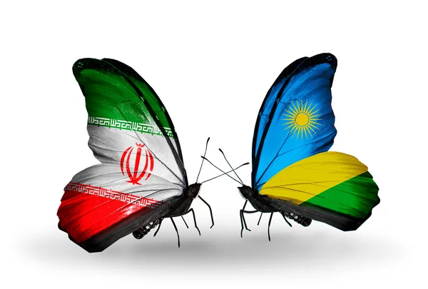 Motyle z flagami Iranu i Rwandzie — Zdjęcie stockowe