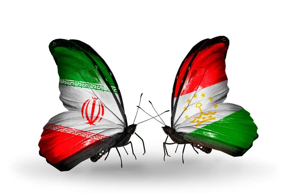 Метеликів з прапорами Іран і Таджикистан — стокове фото