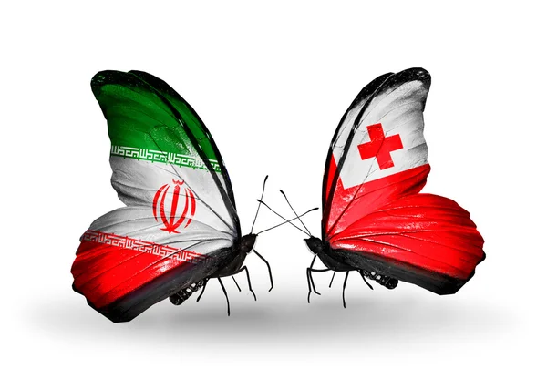 イラン、トンガの国旗と蝶 — ストック写真