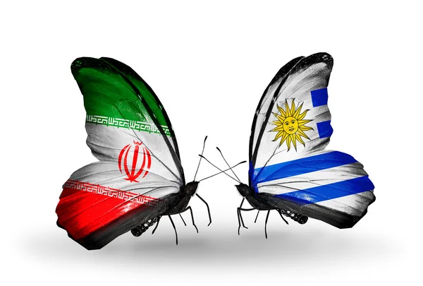 Butterflies with flags of Iran and Uruguay — Stock Photo, Image