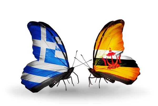 Yunanistan ve brunei bayrakları taşıyan kelebekler — Stok fotoğraf
