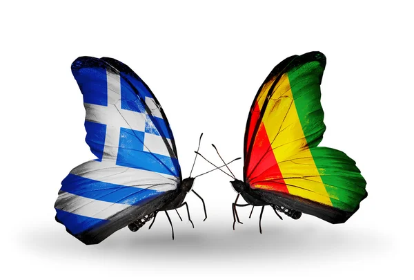 Butterflies with flags of Greece and Guinea — Stock Photo, Image